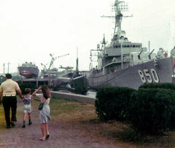 Lee Duquette and his children by the battle ships in 1975