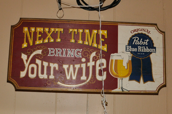 Signs in the campground office / the bar.