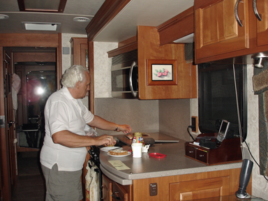 Lee cooking in our RV
