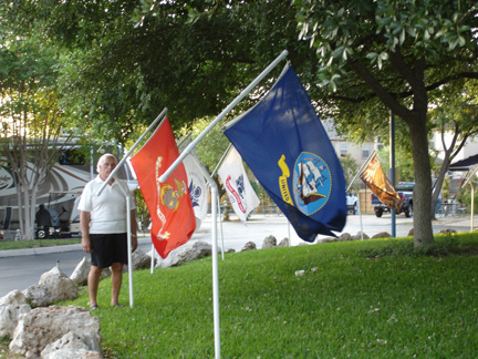 Lee Duquette & flags in the park