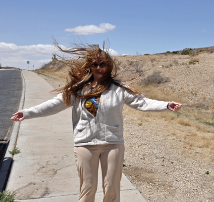 Karen trying to walk in the strong winds