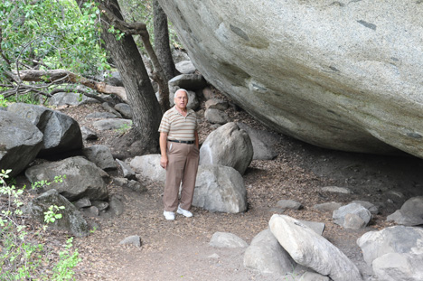 Lee Duquette by a big boulder