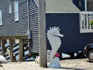 seahorse statue in front of a house