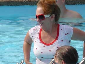 Karen jumps in the pool