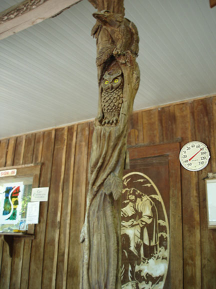 Carving on the post at the Outpost